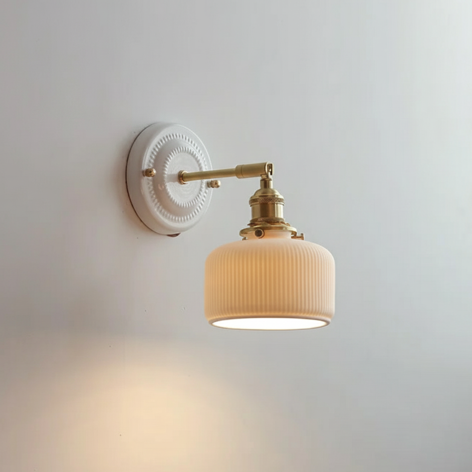 Ceramic wall lamp with brass arm and grooved vintage mini shade