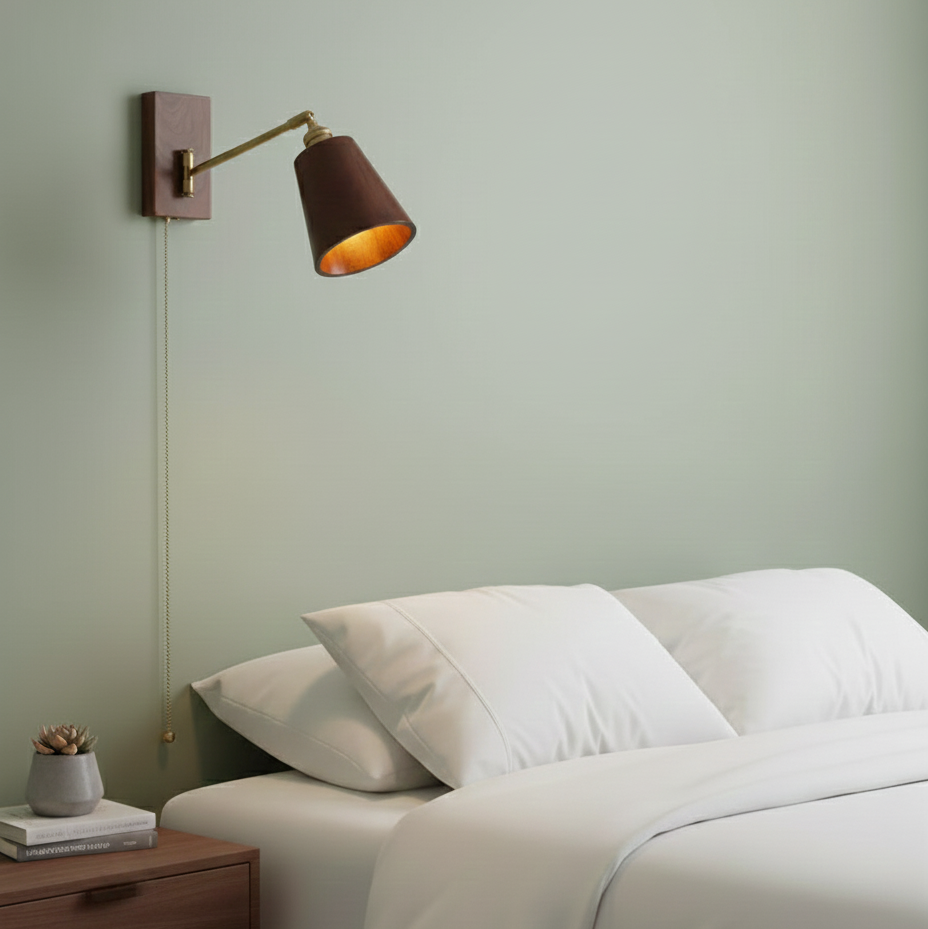 Walnut wall lamp with swivel arm and warm vintage conical shade