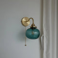 Blue-green glass ball wall lamp with pull switch &amp; elegant brass arc