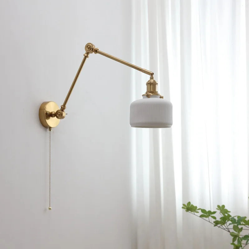 Swivel vintage wall lamp made of brass with ceramic shade