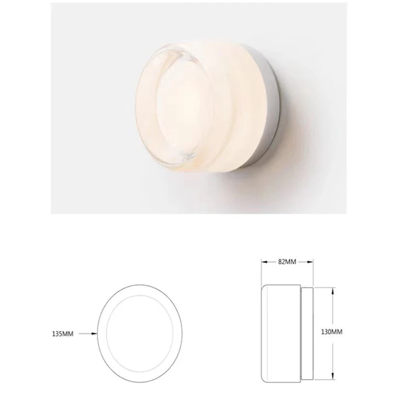 Round acrylic wall lamp with a soft vintage glow.
