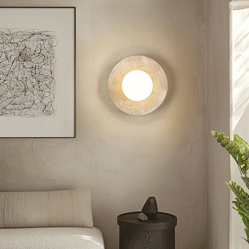 Round travertine wall lamp with soft glass light in vintage style
