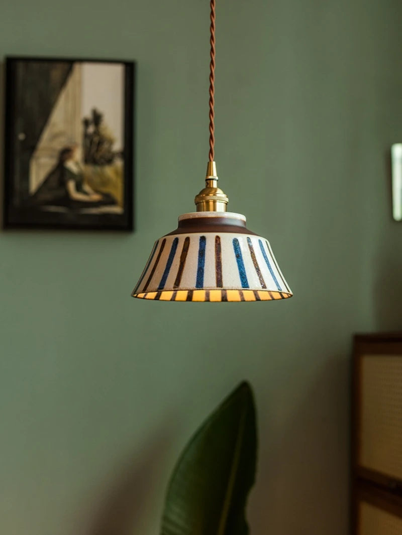 Ceramic pendant light with hand-painted striped pattern