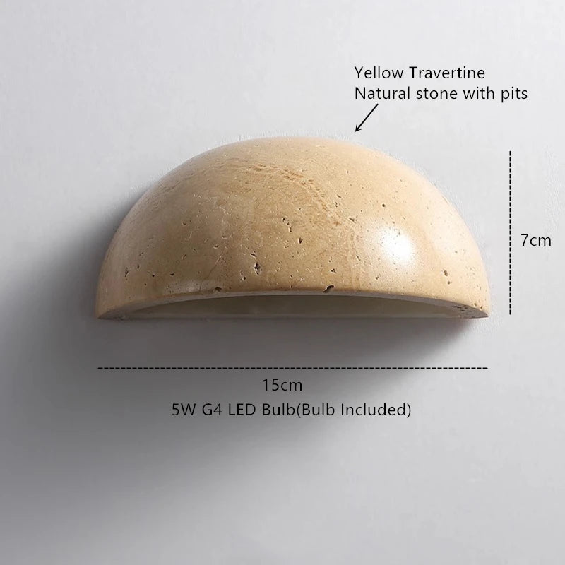 Semi-circular travertine wall light for warm, natural ambient light