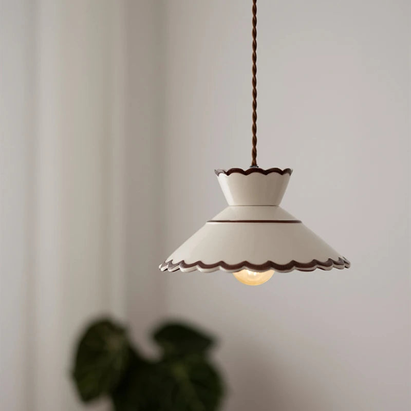 Ceramic pendant light with two-tiered vintage wave shade