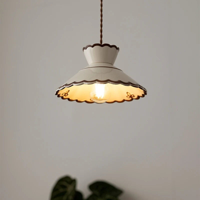 Ceramic pendant light with two-tiered vintage wave shade