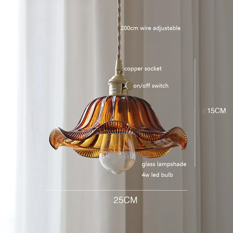 Vintage copper pendant lamp with amber-colored wave glass shade