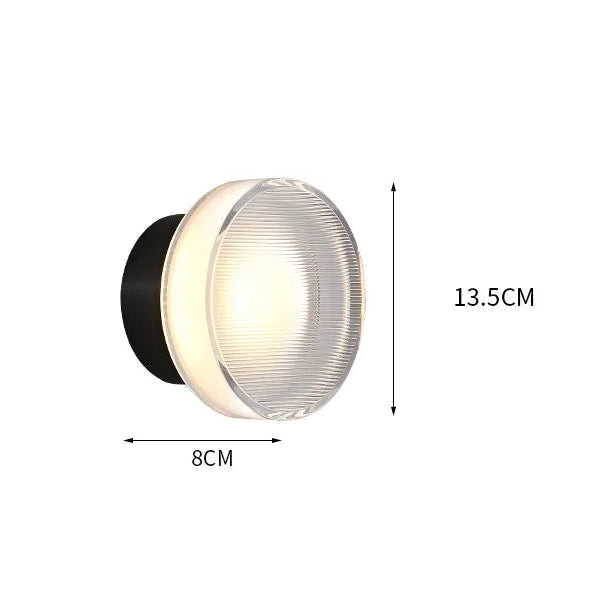 Runde Acryl-Wandleuchte mit feinem Rillenlicht in Schwarz