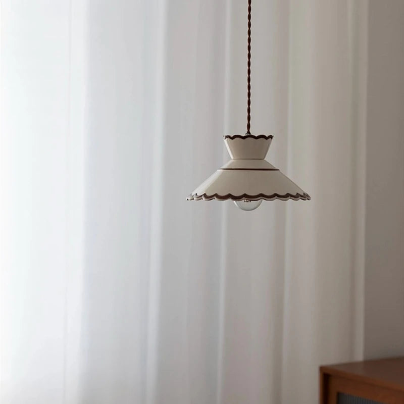 Ceramic pendant light with two-tiered vintage wave shade