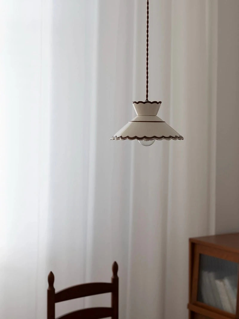 Ceramic pendant light with two-tiered vintage wave shade