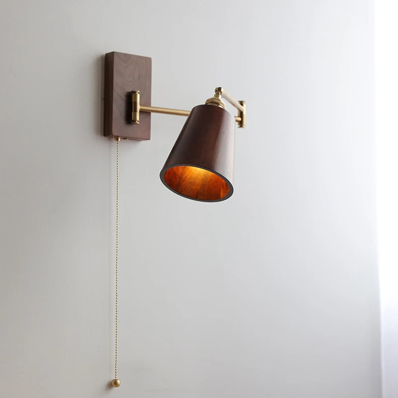 Walnut wall lamp with swivel arm and warm vintage conical shade