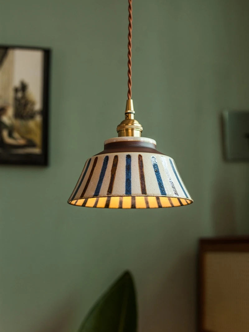 Ceramic pendant light with hand-painted striped pattern