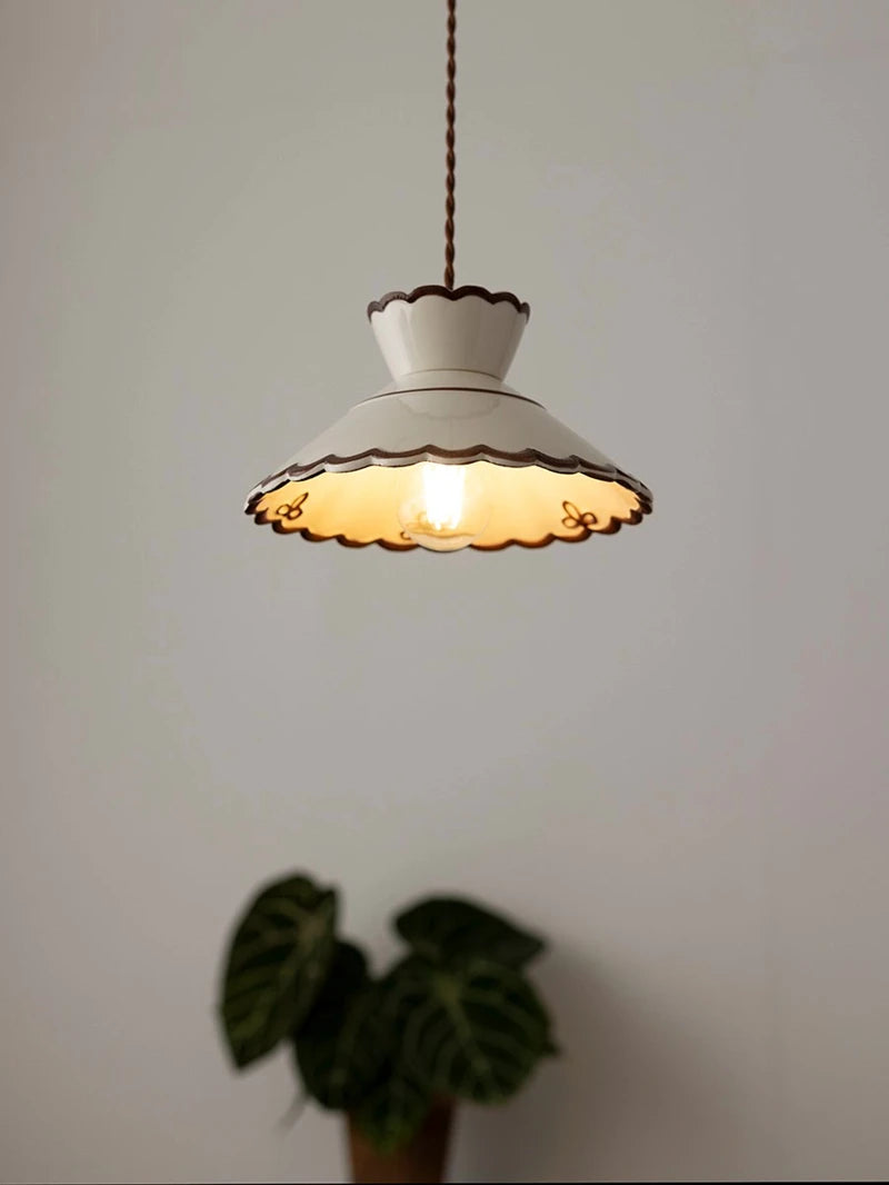 Ceramic pendant light with two-tiered vintage wave shade