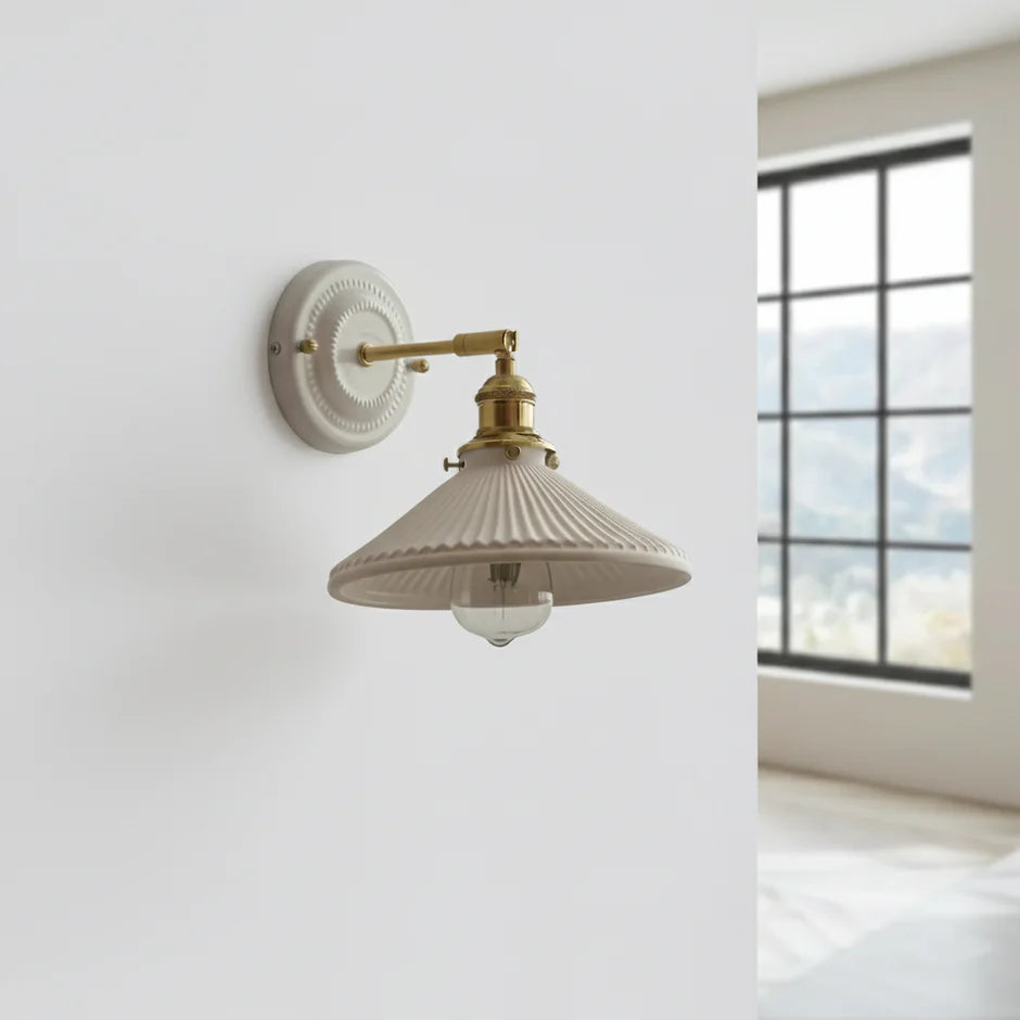 Adjustable ceramic wall lamp with brass arm in vintage style