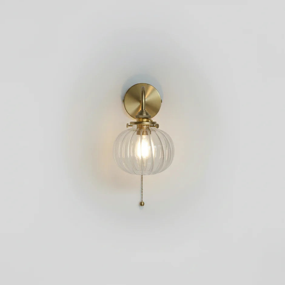 Vintage glass ball wall lamp with elegant brass arch