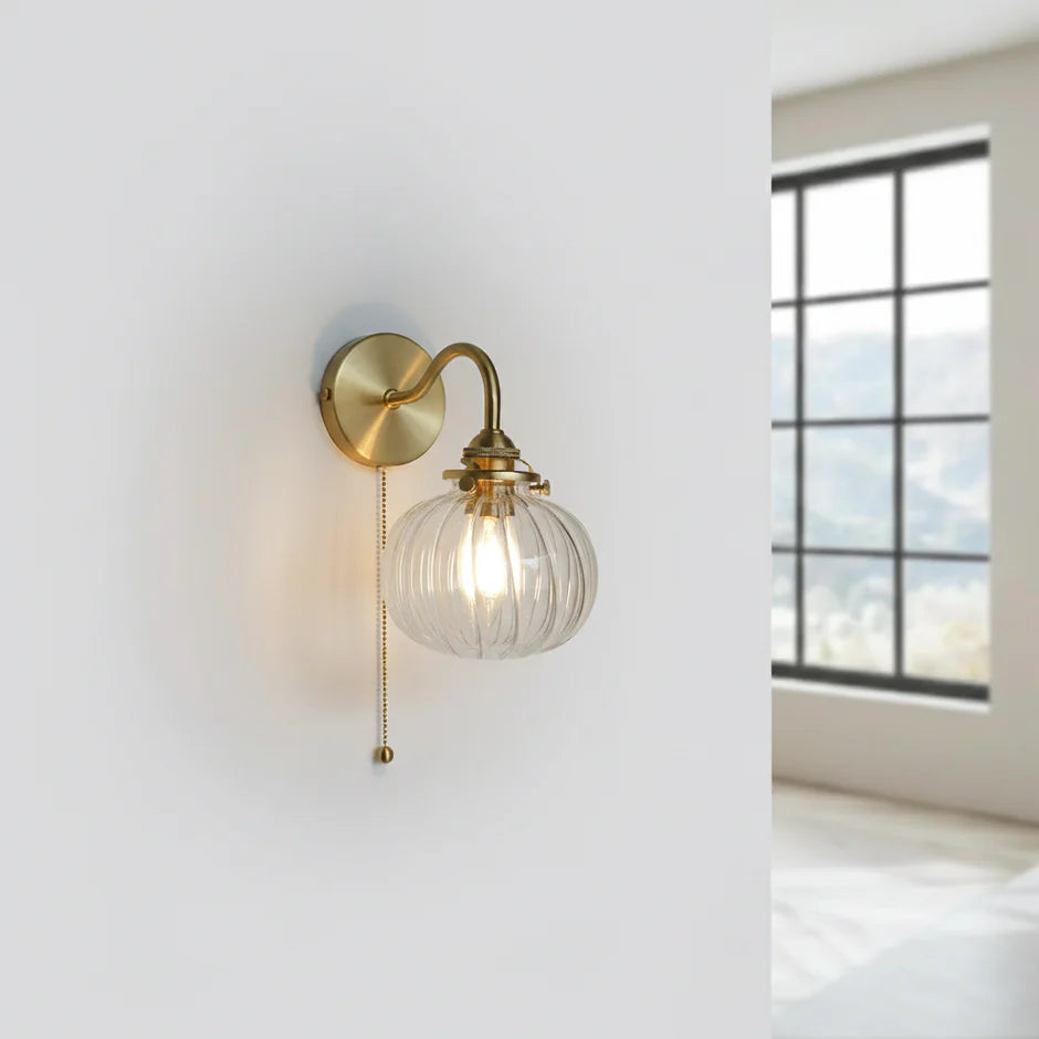 Vintage glass ball wall lamp with elegant brass arch