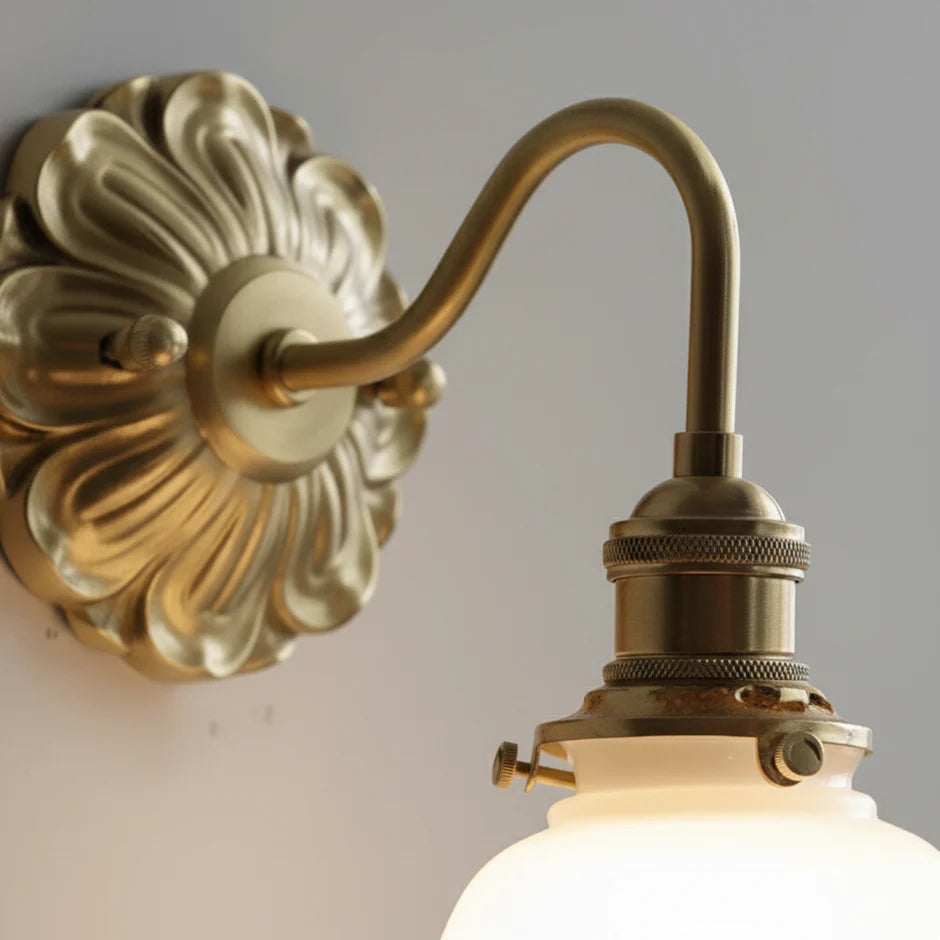 Vintage wall lamp with wavy frosted glass and warm brass arm